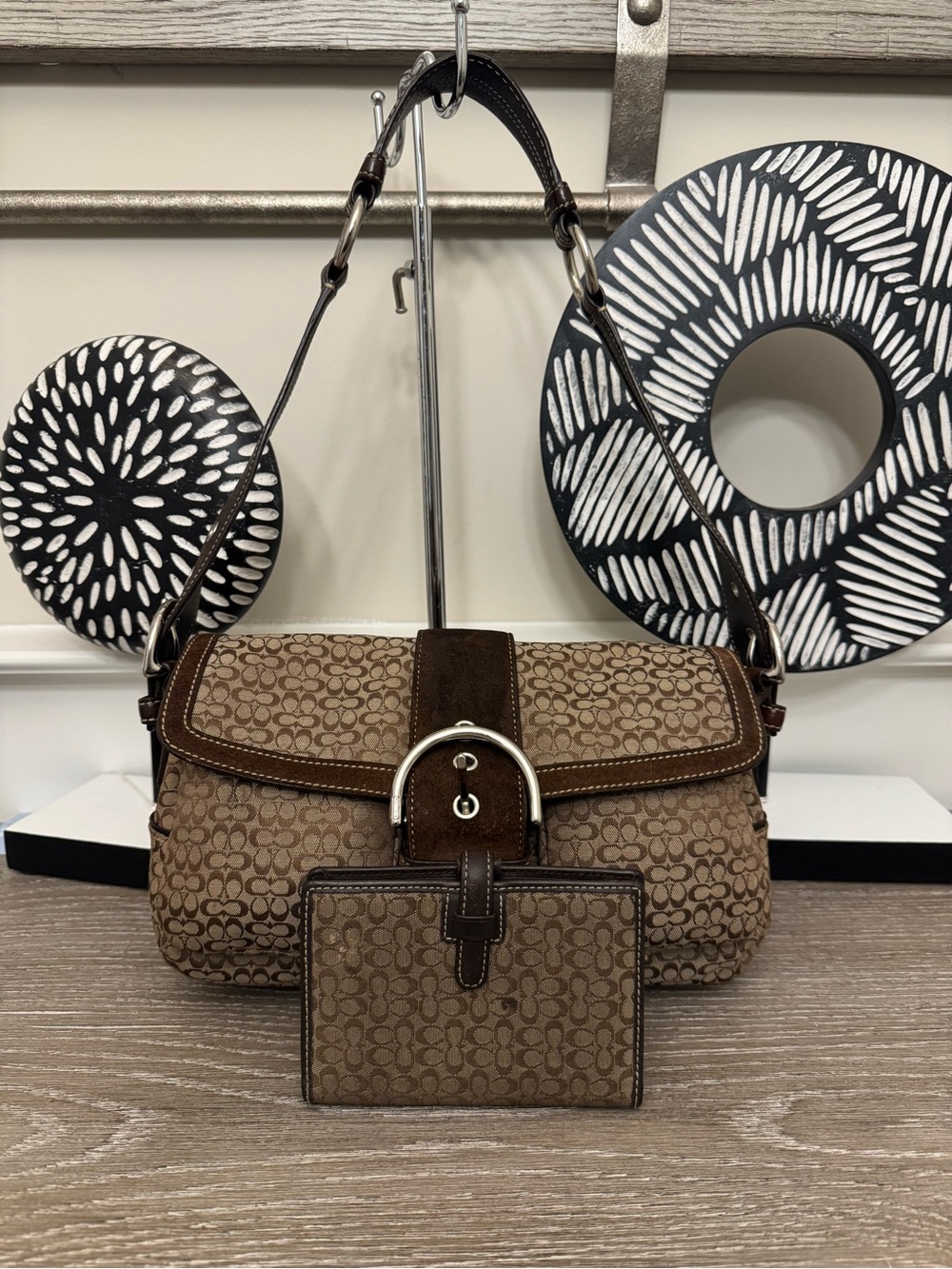 Coach Soho Signature double pocket flap shoulder bag and wallet set.